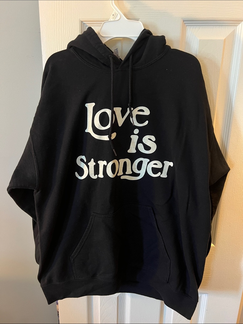 Love Is Stronger Black Hoodie Sweatshirt; Size Large